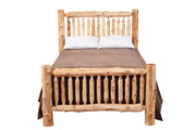 Front view of the Maroon Bells Cedar Log Spindle Bed showing the log spindle headboard and footboard