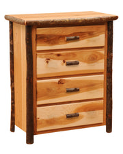 Angled view of the Matterhorn Peak Hickory Log Chest of Drawers in Natural showing four drawers and bark-on log posts