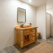 Mears Peak Cedar Log Vanity in the 36-inch sink-left layout in a bathroom