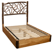 Angled view of the Missouri Mountain Hickory Twig Platform Bed showing the woven hickory twig headboard and slatted platform
