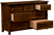 Angled view of the Mount Arkansas Cedar Log Dresser with three drawers open to show the dovetailed cedar drawer boxes