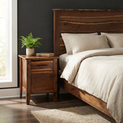 Mount Axtell Live Edge Walnut Enclosed Nightstand beside the matching walnut bed