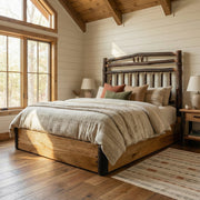 Mount Belford Hickory Wagon Wheel Platform Bed with cream bedding in a bright shiplap bedroom with a wood beam ceiling and tall windows
