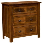 Angled view of the Mount Buckskin Reclaimed Barnwood Chest of Drawers showing three drawers with dark cup pulls