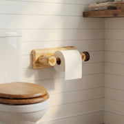 Wall-mounted Mount Cairns Cedar Log Toilet Paper Holder with rod in a rustic bathroom