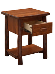 Angled view of the Mount Chapin Hickory Log Nightstand with Shelf in Cinnamon with the drawer open