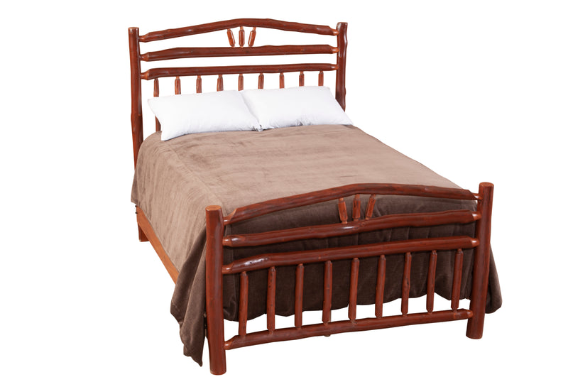 Angled view of the Mount Columbia Hickory Wagon Wheel Bed with brown bedding showing hickory wagon wheel spokes in the headboard and footboard