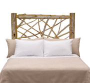Front view of the Mount Democrat Cedar Log Twig Headboard styled with white pillows and tan bedding
