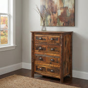 Mount Edwards Barnwood and Hickory Chest of Drawers beneath an abstract painting near a window with dried branches in a vase