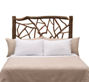 Front view of the Mount Eolus Hickory Log Twig Headboard styled with white pillows and taupe bedding