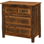 Angled view of the Mount Eva Barnwood and Hickory Chest of Drawers showing three barnwood drawers and hickory log accents
