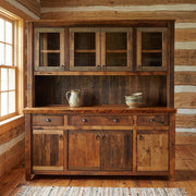 Mount Guero Reclaimed Barnwood Long Buffet and Hutch staged in a sunlit log cabin dining room