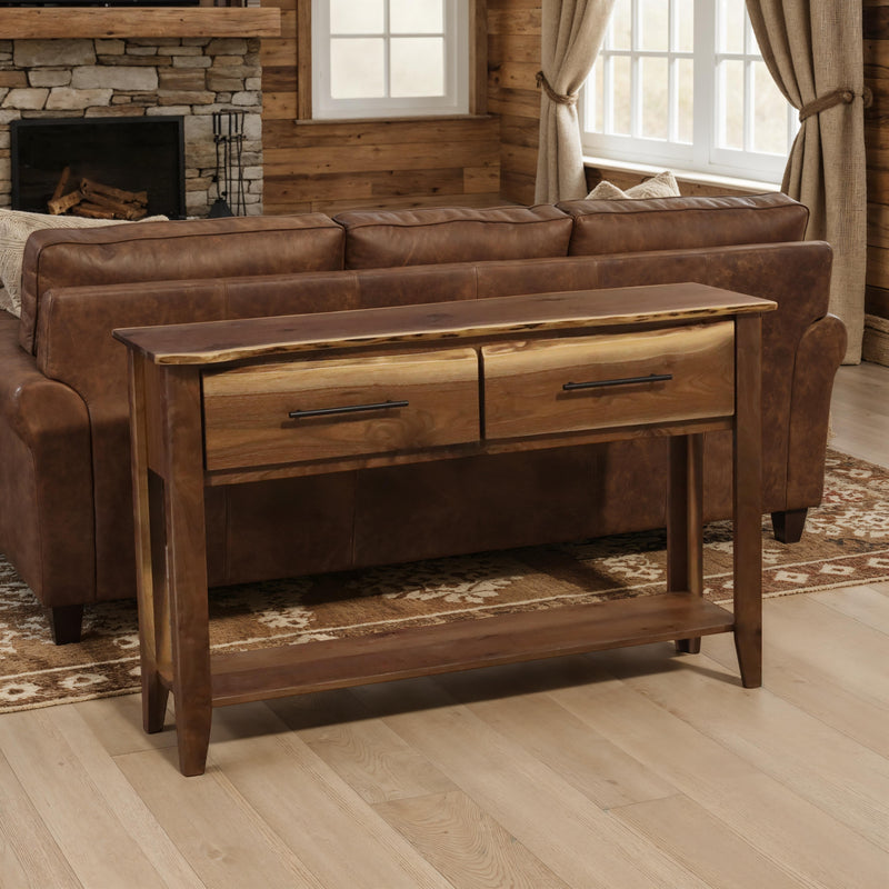 Mount Gunnison Live Edge Walnut Sofa Table behind a sofa in a cabin living room