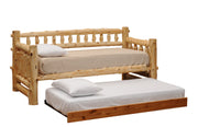 Angled view of the Mount Guyot Cedar Log Daybed with the roll-out trundle pulled out and made up as a second twin bed