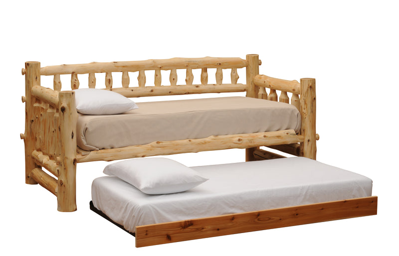 Angled view of the Mount Guyot Cedar Log Daybed with the roll-out trundle pulled out and made up as a second twin bed