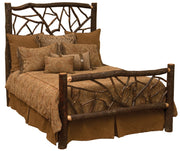 Angled view of the Mount Harvard Hickory Log Twig Bed with brown bedding showing the bark-on hickory twig headboard and footboard