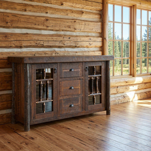 Mount Herman Barnwood and Hickory Windowpane Sideboard staged in a sunlit log cabin dining room
