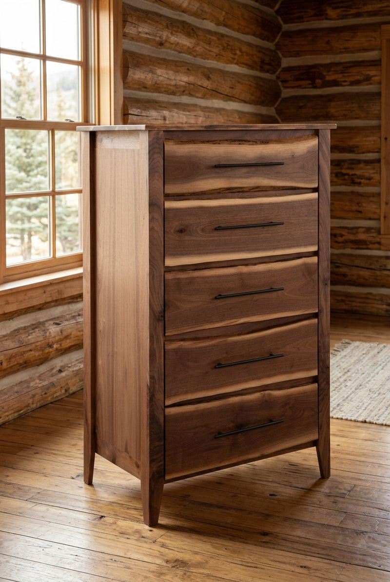 Mount Lamborn Live Edge Walnut Five Drawer Chest staged in a sunlit log cabin bedroom