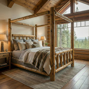 Mount Massive Cedar Log Canopy Bed with neutral bedding and a fur throw in a vaulted log cabin bedroom with forest views