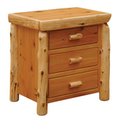 Angled view of the Mount Nystrom Cedar Log Three Drawer Bedside Chest showing three full-width drawers and cedar log posts