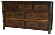 Angled view of the Mount Oklahoma Barnwood and Hickory Dresser showing seven drawers framed by hickory log accents