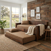 Mount Ouray Reclaimed Barnwood Daybed with trundle in a rustic farmhouse sunroom with a reclaimed barnwood accent wall