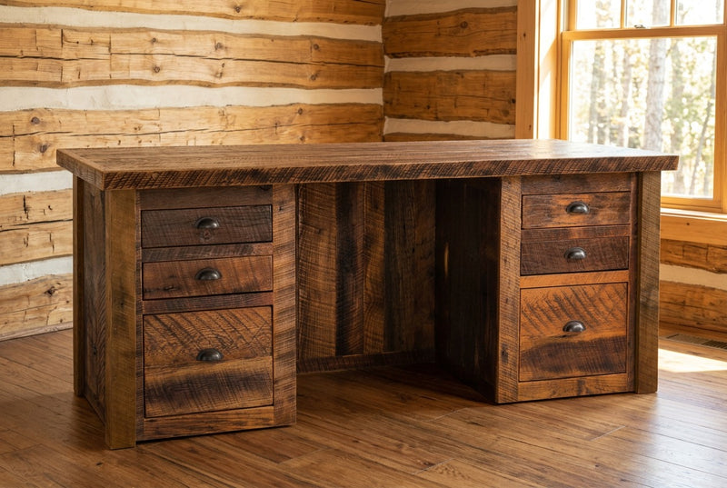 Mount Owen Reclaimed Barnwood Executive Desk staged in a sunlit log cabin home office