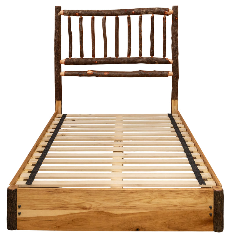 Front view of the Mount Oxford Hickory Log Platform Bed with bark-on hickory spindle headboard and solid platform rails