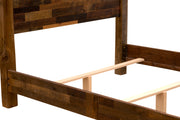 Detail of the Mount Princeton Reclaimed Barnwood Bed side rail, center support, and slats