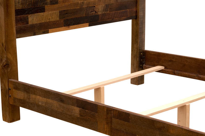 Detail of the Mount Princeton Reclaimed Barnwood Bed side rail, center support, and slats