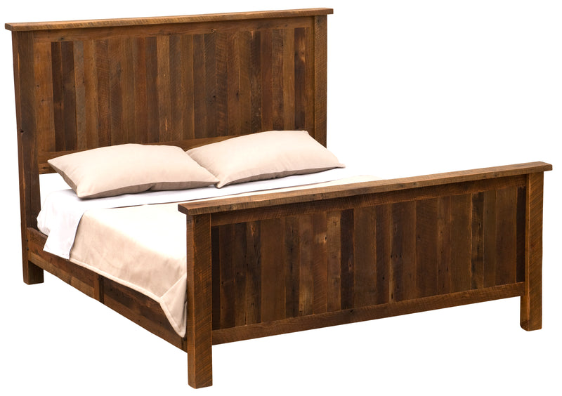 Angled view of the Mount Sneffels Reclaimed Barnwood Bed showing reclaimed oak plank headboard and footboard