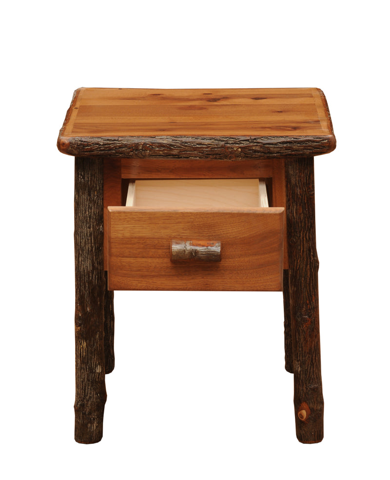 Front view of the Mount Sniktau Hickory Log One Drawer Nightstand in Cognac with the dovetailed drawer pulled out