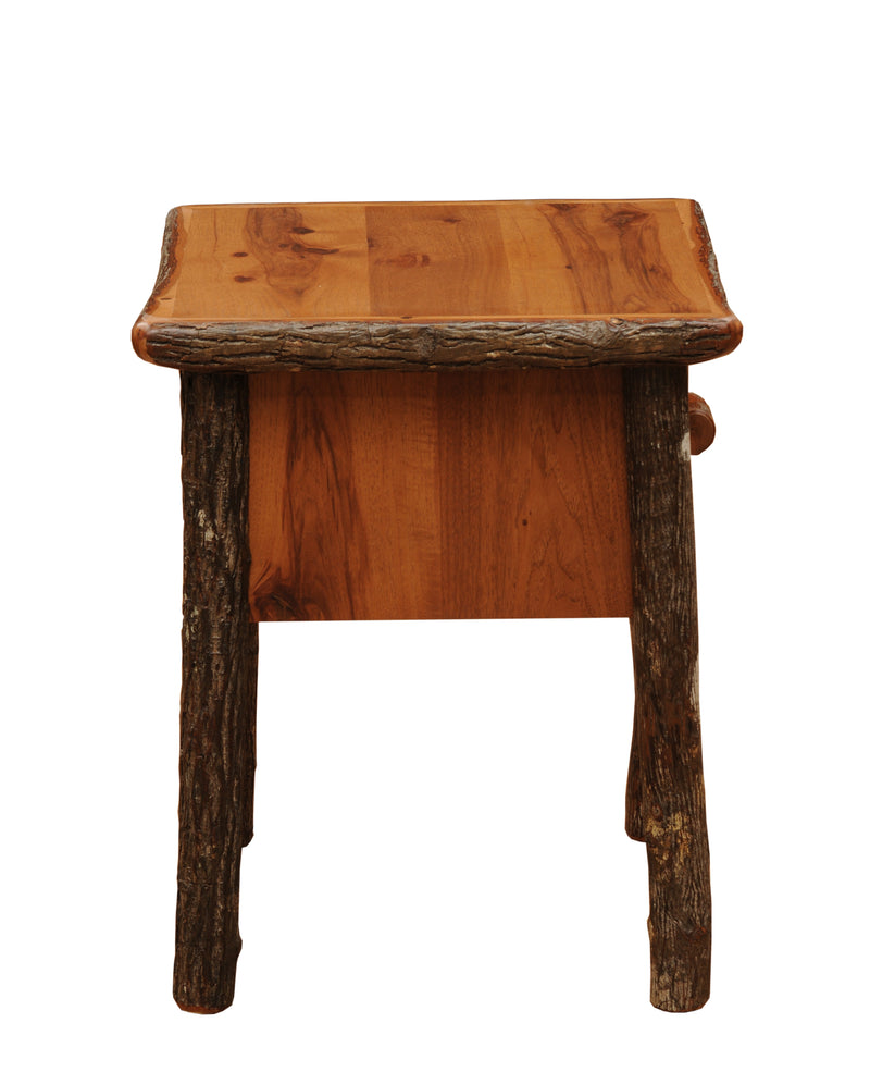 Side view of the Mount Sniktau Hickory Log One Drawer Nightstand in Cognac showing the hickory side panel