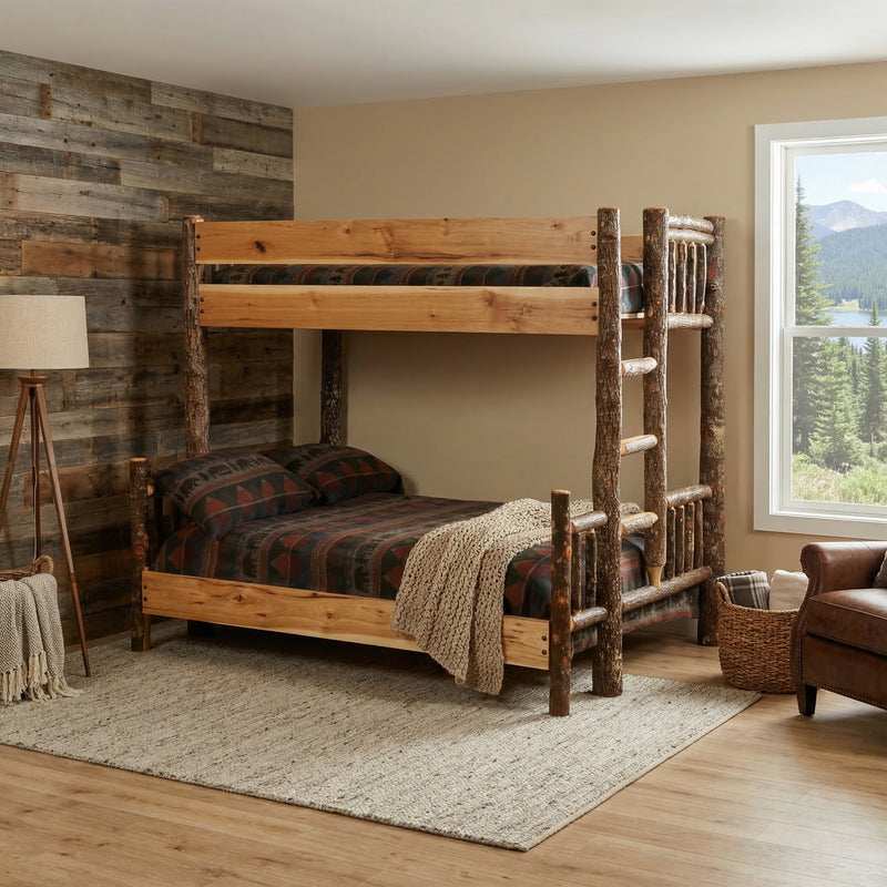 Mount Tabeguache Hickory Log Bunk Bed in Twin over Full configuration beside a barnwood accent wall and leather chair