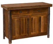 Angled view of the Mount Trelease Barnwood and Hickory Buffet showing hickory log legs