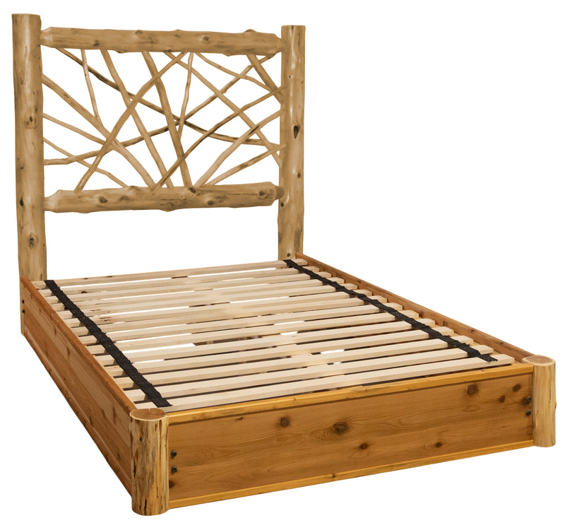 Angled view of the Mount Yale Cedar Log Twig Platform Bed showing the woven cedar twig headboard and slatted platform