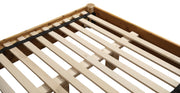 Close-up of the Mount Yale Cedar Log Twig Platform Bed platform slats and center support beside a cedar log corner post