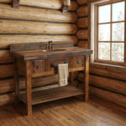 Mount Zion Reclaimed Barnwood Two Drawer Vanity with Artisan Top staged in a sunlit log cabin bathroom