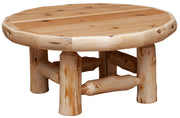 Angled view of the Mummy Mountain Cedar Log Round Coffee Table showing the round cedar top and log legs