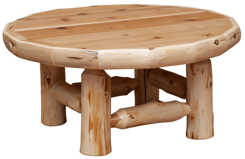 Angled view of the Mummy Mountain Cedar Log Round Coffee Table showing the round cedar top and log legs