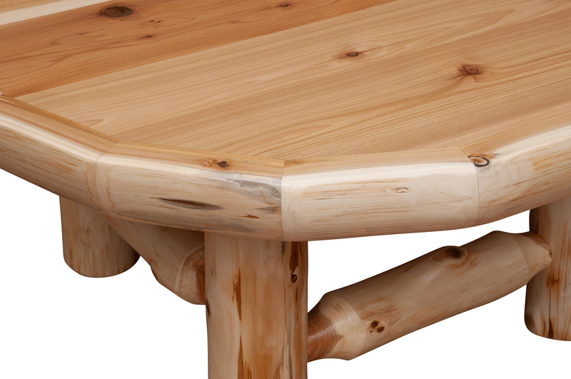 Close-up of the Mummy Mountain Cedar Log Round Coffee Table cedar top edge and log leg