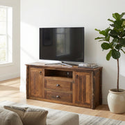 Nimbus Mountain Barnwood and Hickory Widescreen TV Stand holding a flat-screen TV in a cabin living room