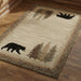 Northwoods bear rug with pinecones and pine trees in a rustic room