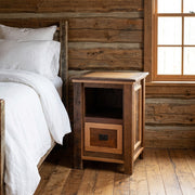 Notch Mountain Reclaimed Barnwood Cubby Nightstand staged in a sunlit log cabin bedroom