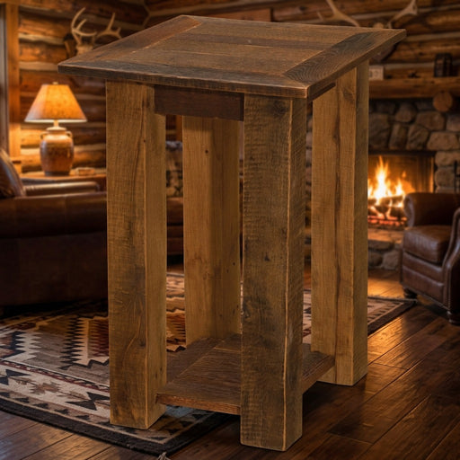 Ogalalla Peak reclaimed barnwood open end table staged in a log cabin living room with a fireplace