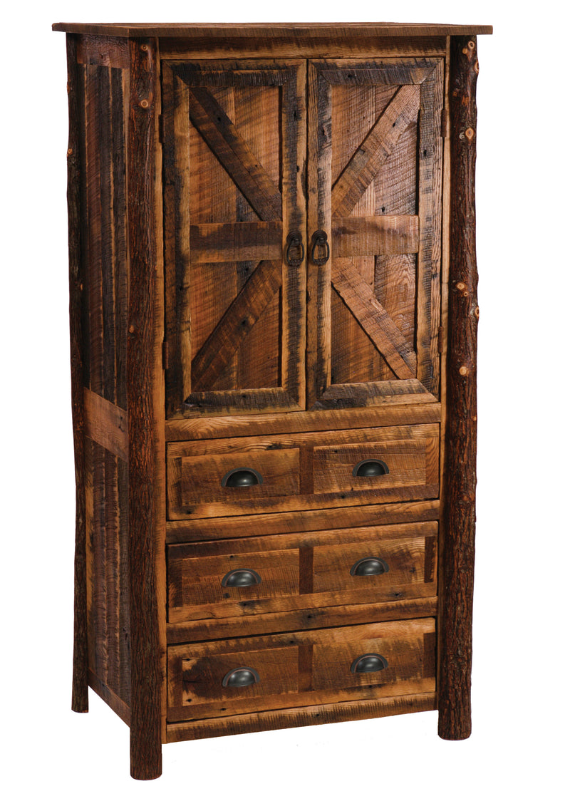 Angled view of the Otis Peak Barnwood and Hickory Armoire showing barn-door cabinet doors and hickory log posts