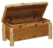 Pacific Peak Cedar Log Blanket Chest with the lid open showing the non-slamming hinges and roomy interior