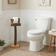 Freestanding Pearl Mountain Hickory Log Toilet Paper Holder beside a toilet