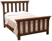 Angled view of the Pikes Peak Reclaimed Barnwood Post Bed with white bedding, slatted panels, and thick reclaimed oak posts