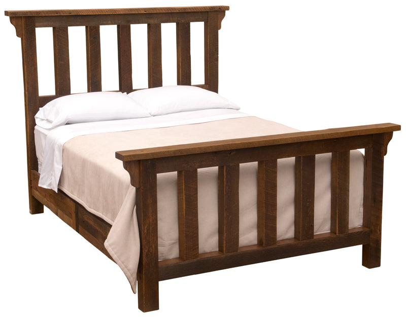 Angled view of the Pikes Peak Reclaimed Barnwood Post Bed with white bedding, slatted panels, and thick reclaimed oak posts
